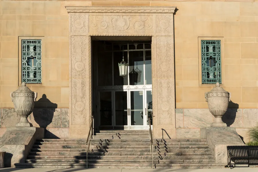 Stone steps leading up to a courthouse entrance